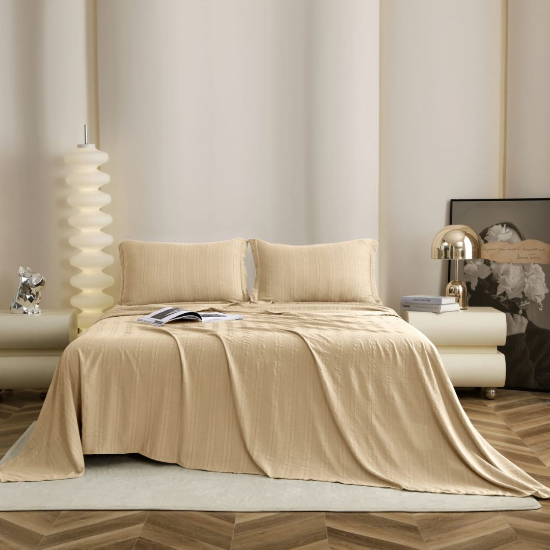 Soft English colors bedding set with 3 premium bedsheets from The Gharnish, showing folded sheets in natural fabric texture.