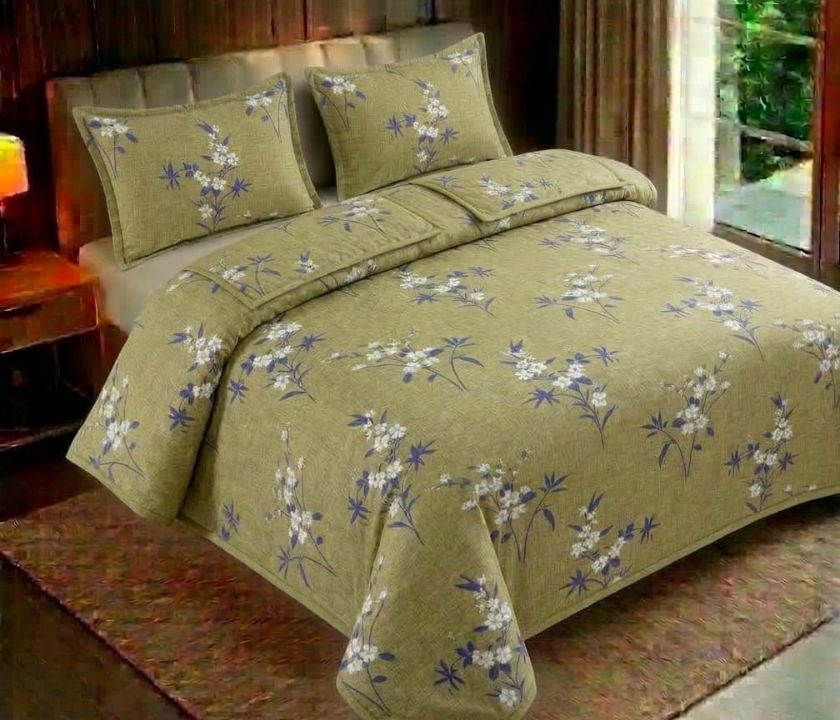 Reversible floral bedding set by The Gharnish featuring vibrant floral patterns on soft fabric, includes three matching pieces.