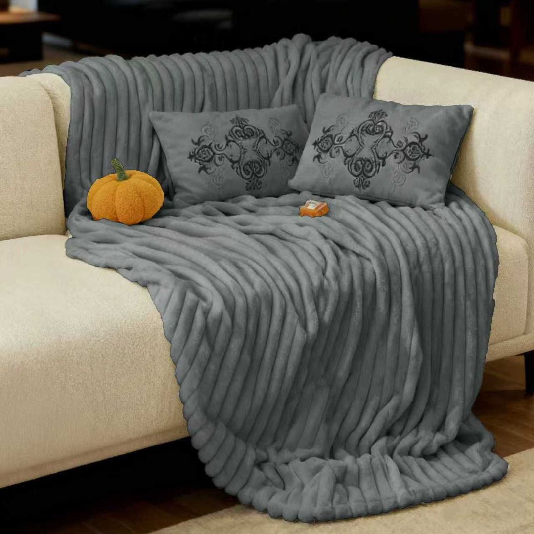 Luxury designer rabbit fur style blanket by The Gharnish, plush and warm winter blanket with a soft, cozy texture.