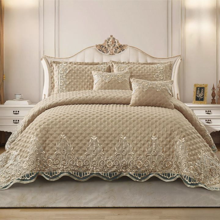 Luxury embroidered bedding set with decorative pillows and matching sheets from The Gharnish, showcasing intricate embroidery and soft fabric.