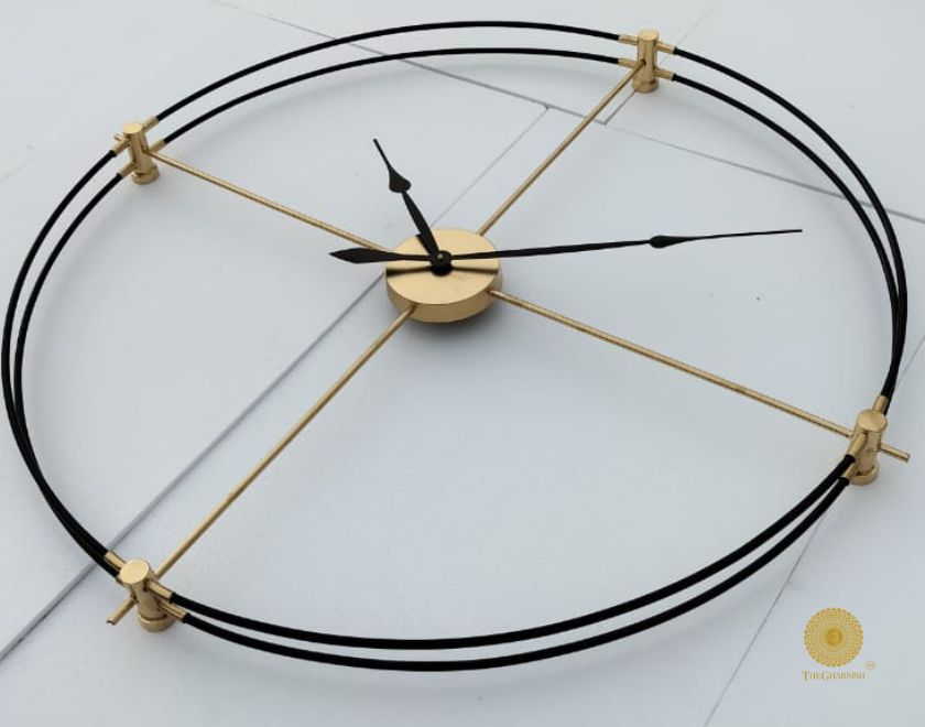 Make a statement with this stylish 24” double-ring wall clock. Expertly designed from durable metal, this clock adds a modern touch to any room – timeless and sleek. Great for any indoor space.