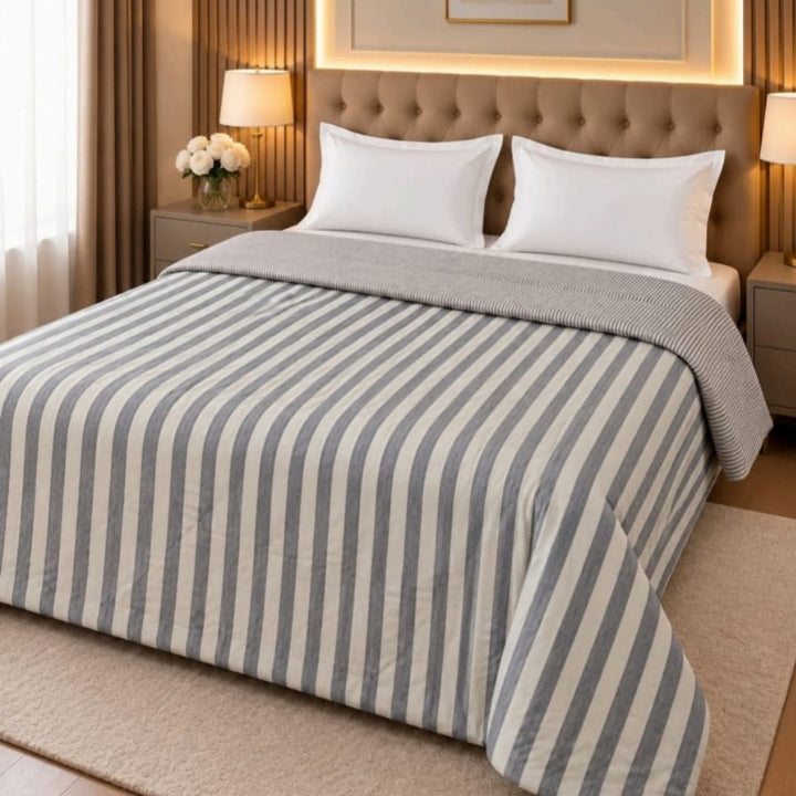Milano imported super soft comforter by The Gharnish, featuring plush fabric and cozy bedding design in a close-up view.