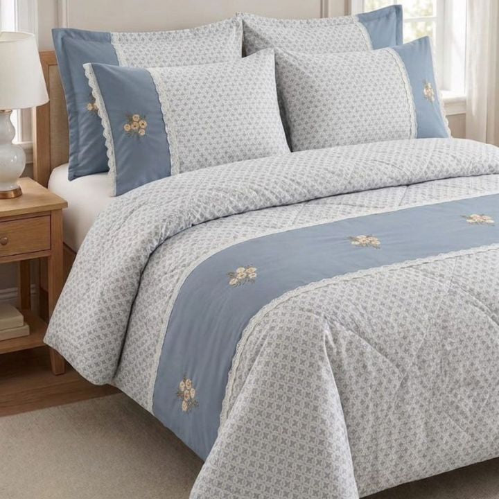 Floriana king size all-season comforter set by The Gharnish with matching pillow shams and bedding accessories in a cozy, premium design.