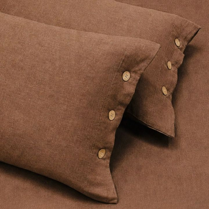 Organic muslin cotton king size bedsheet set from The Gharnish, showing soft, lightweight fabric with a subtle woven pattern.