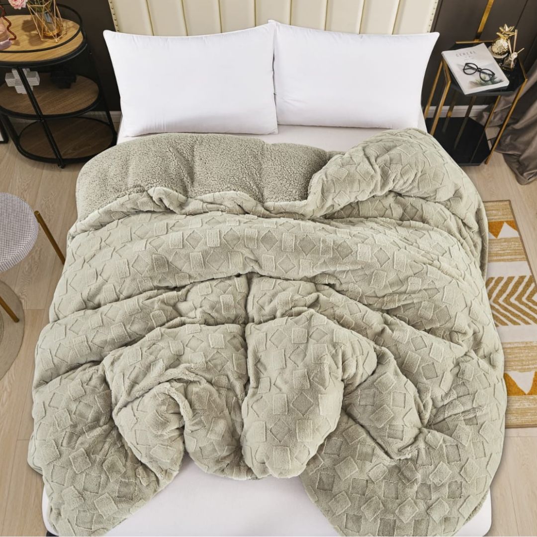The Gharnish 2-in-1 rabbit fur and sherpa blanket and duvet cover set, plush all-season luxury bedding with soft, cozy textures.