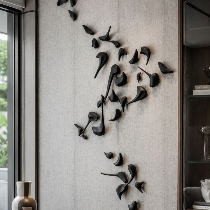 Resin wall art sculpture titled "Flight of Freedom" by The Gharnish, featuring abstract bird design on a neutral background.