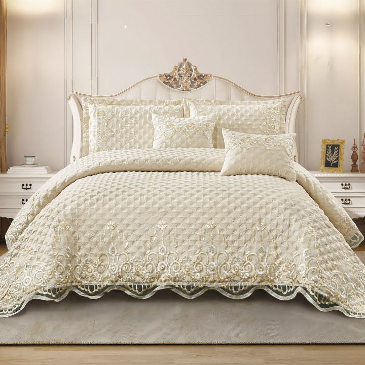Luxury embroidered bedding set with matching pillowcases and bedspread from The Gharnish, featuring intricate embroidery and soft fabric.