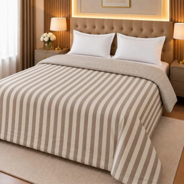 Milano imported super soft comforter by The Gharnish shown in a cozy bed with plush fabric and gentle folds.
