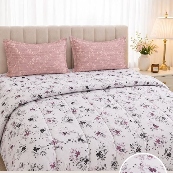 The Gharnish Boutique Fit 4-piece king size bedding comforter set with matching pillow shams, displayed on a neatly made bed.