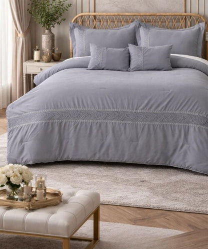 Luxury king-size The Gharnish comforter set with four super soft, all-season bedding pieces on a neatly made bed.