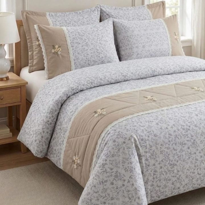 The Gharnish Floriana king size all-season comforter set with four premium bedding pieces, featuring elegant fabric and cozy design.