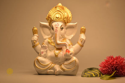 White Marble Laddoo Ganesha Statue