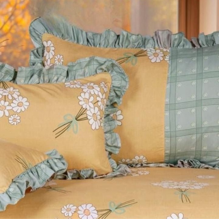 Serenity Bloom quilted bedding set with 5 pieces from The Gharnish, featuring floral patterns and soft fabric for a cozy bedroom.