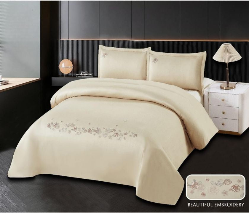 Elegant 100% cotton embroidery bedding set by The Gharnish featuring intricate embroidered patterns on soft, comfortable bedding.