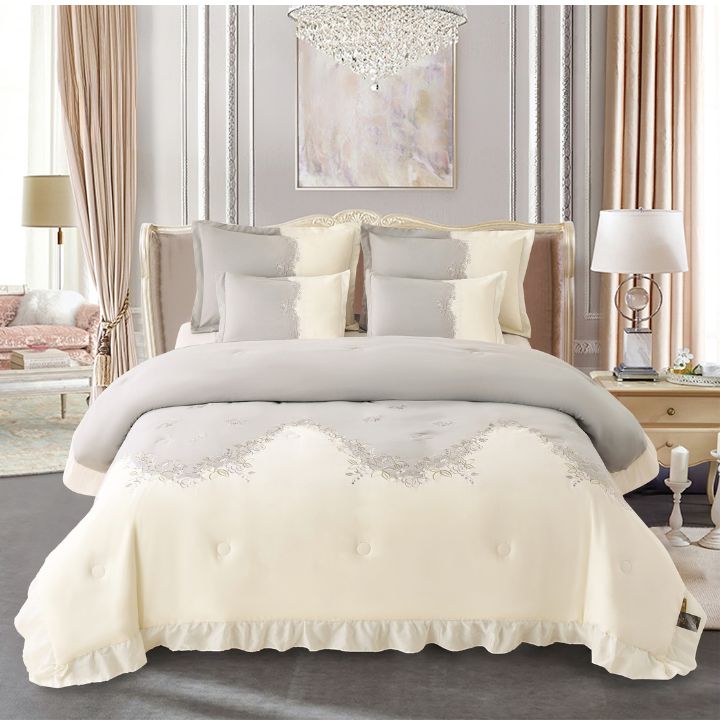 Elegant Regal Blush Aura romantic embroidered bedding set with 6-piece comforter and bedsheets by The Gharnish, featuring intricate floral embroidery.