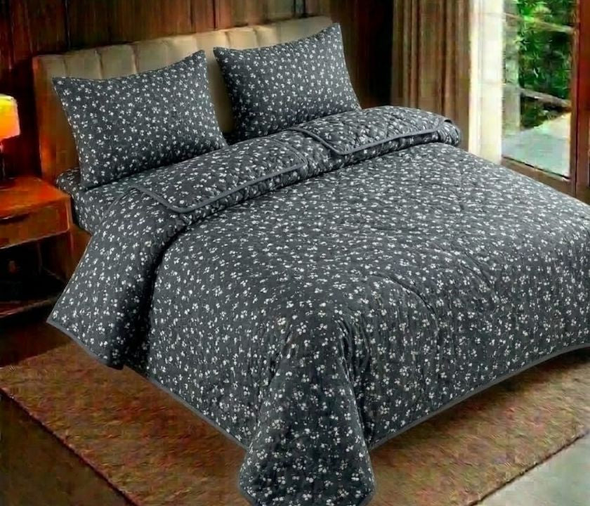 Reversible floral bedding set by The Gharnish with three pieces, featuring vibrant floral patterns on soft fabric.