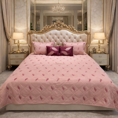 King size quilted bedcover by The Gharnish featuring Irish designer bedding with intricate quilting details.