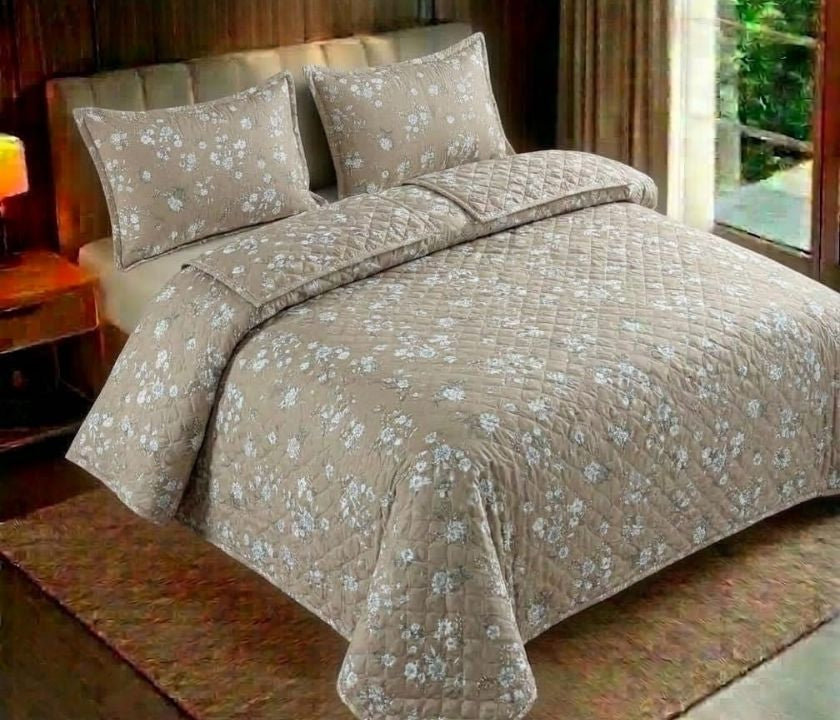 Reversible floral bedding set from The Gharnish with three pieces, featuring colorful floral patterns and soft fabric.