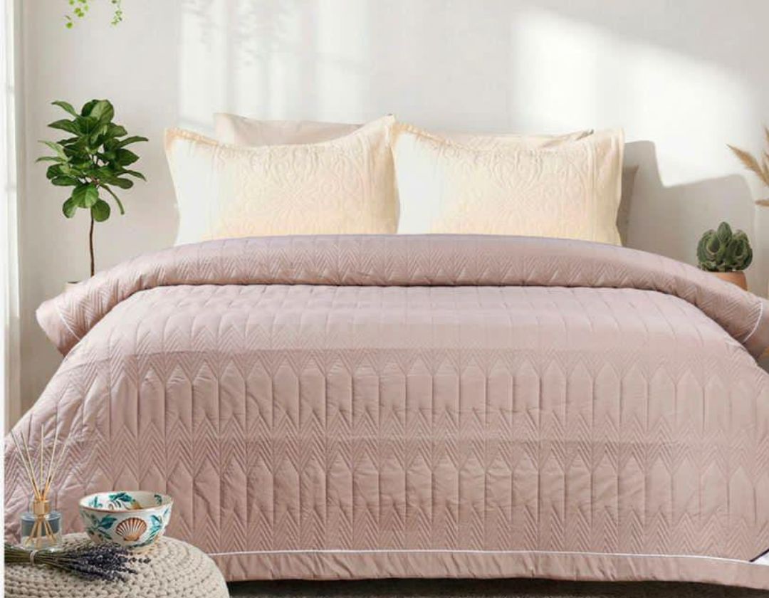 Lightweight luxury bedding comforter from The Gharnish, ideal for all-season warmth and comfort.