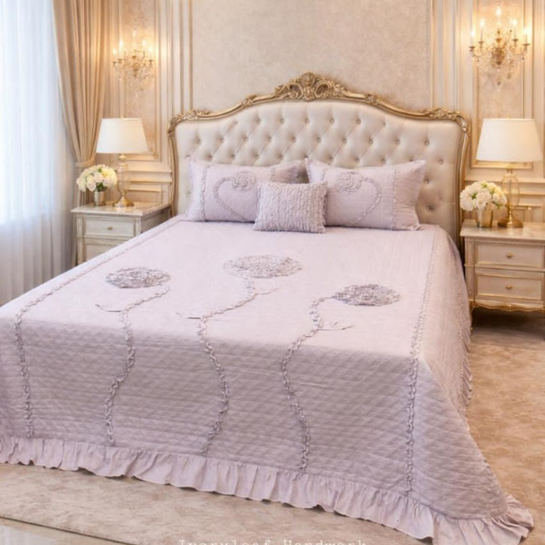 Ivory leaf handwork super designer king size quilted bedcover from The Gharnish, featuring intricate leaf embroidery on soft bedding fabric.