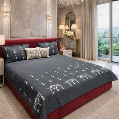 Luxurious quilted bedcover from The Gharnish Urban Designer collection, featuring a stylish, textured bedding design.