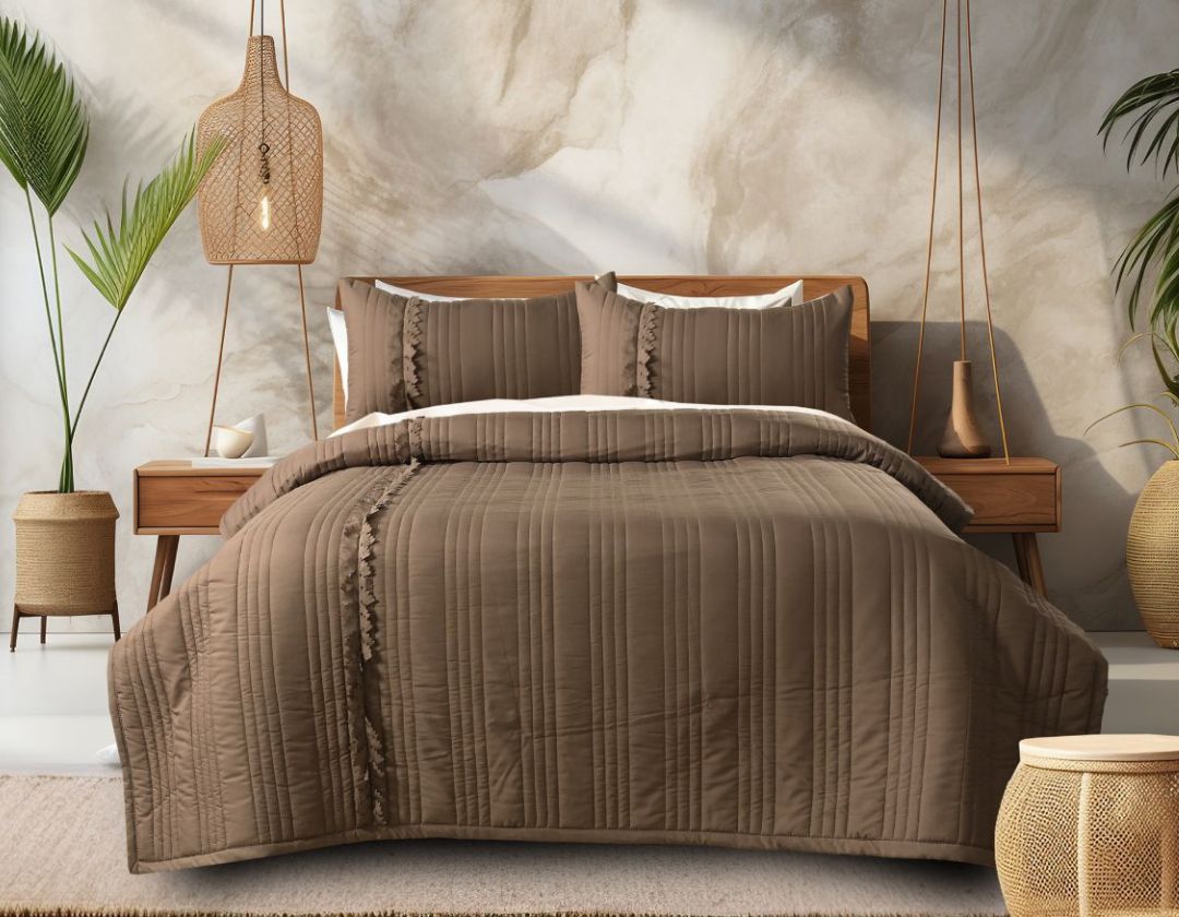 King size designer quilted bedcover with cut work frill from The Gharnish, featuring intricate quilting and elegant detailing.