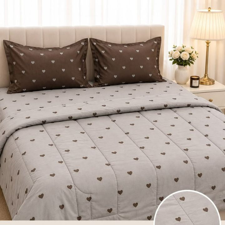 The Gharnish Boutique Fit 4-piece king size comforter bedding set with matching pillow shams and decorative accents.