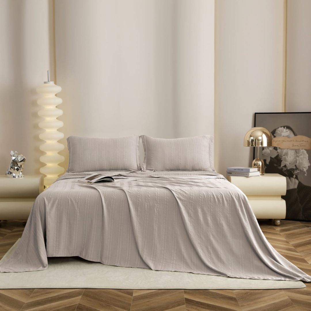 Premium bedding bedsheet 3-piece set in soft English colors by The Gharnish, featuring smooth fabric and elegant design.
