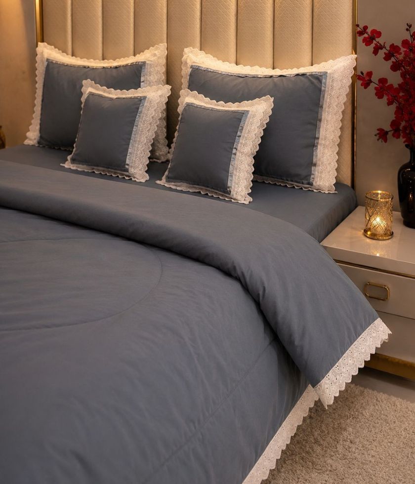 Luxury quilted king size bedcover set by The Gharnish, featuring six bedding pieces with elegant stitching and plush fabric.