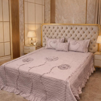 Ivory leaf handwork super designer king size quilted bedcover by The Gharnish, featuring intricate leaf embroidery and plush bedding design.