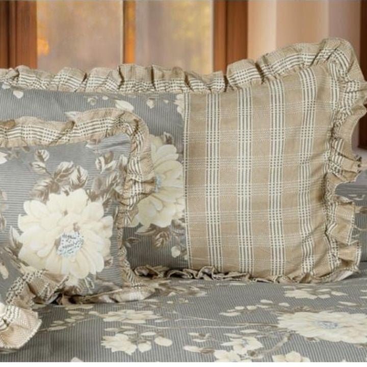 Serenity Bloom quilted bedding set with five pieces from The Gharnish, featuring floral patterns and soft fabric for a cozy bedroom.