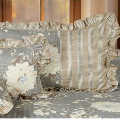 Serenity Bloom quilted bedding set with five pieces from The Gharnish, featuring floral patterns and soft fabric for a cozy bedroom.