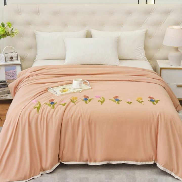 The Gharnish Florista Double Bed Embroidery Comforter with floral embroidery on soft fabric for a cozy, decorative bed cover.