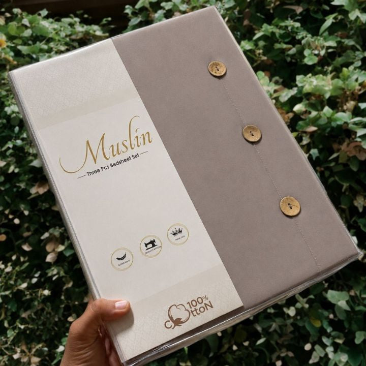 Organic muslin cotton king size bedsheet set by The Gharnish, showing the soft, breathable bedding with a subtle pattern.