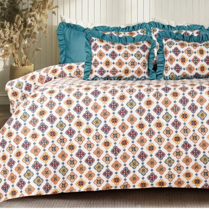Serenity Bloom quilted bedding set by The Gharnish with 5 pieces, featuring floral patterns and soft fabric for a cozy bedroom look.