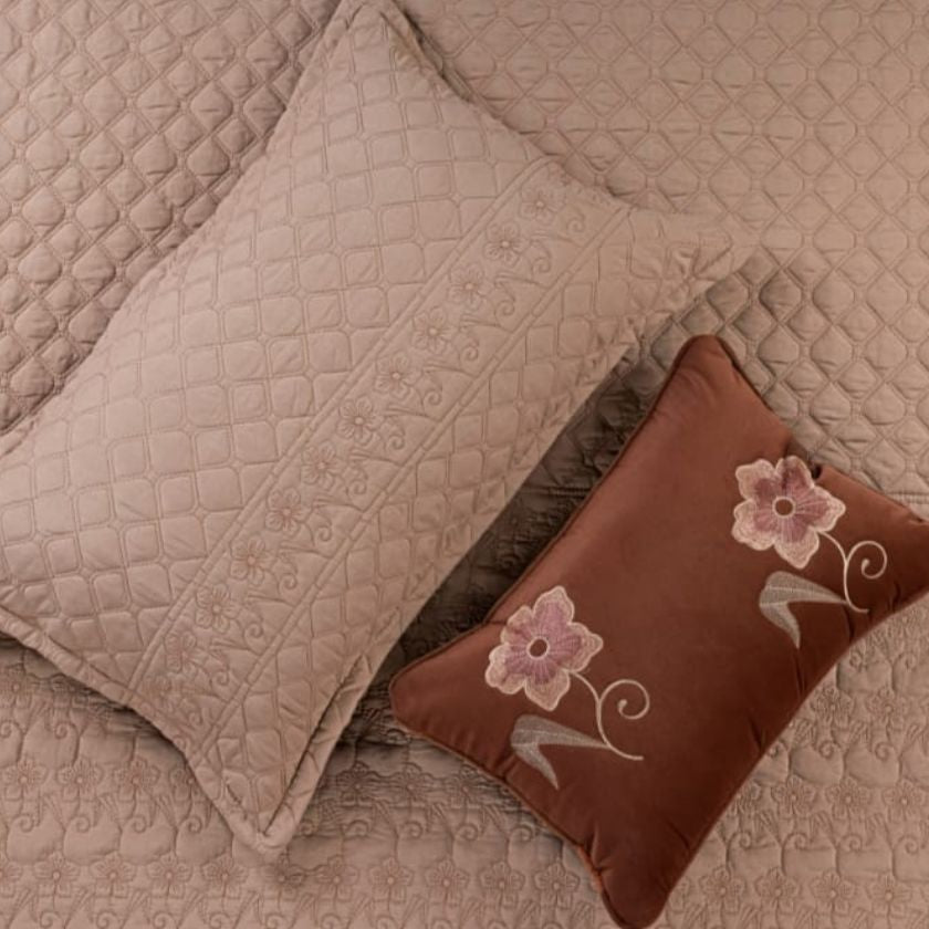 Luxurious Flora 6-piece wedding bedding set by The Gharnish, featuring elegant floral design and plush fabric for a romantic bedroom.