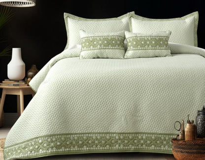 Luxury quilted embroidered bedding set with five pieces, featuring intricate patterns and soft fabric from The Gharnish.
