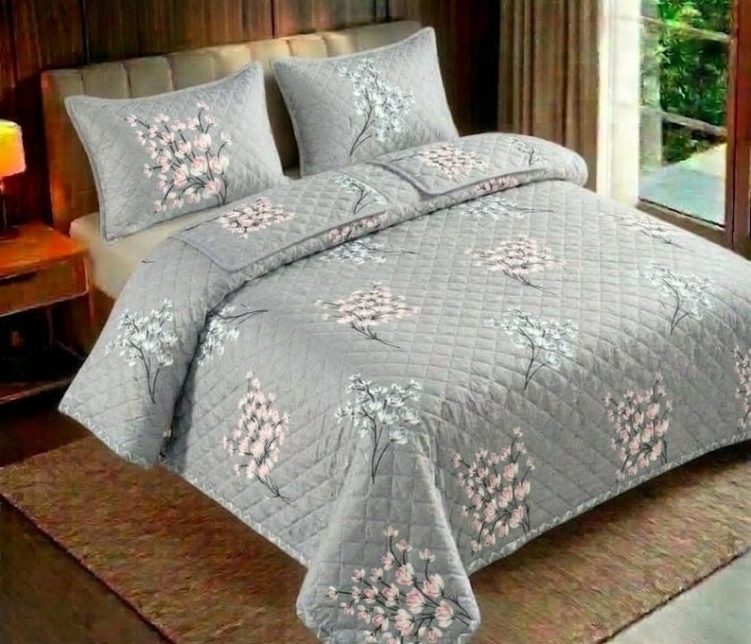 Reversible floral bedding set with three pieces from The Gharnish, featuring colorful flower patterns and soft fabric.