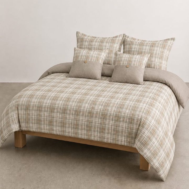 Gingham 6-piece premium comforter bedding set by The Gharnish with blue and white checked pattern on a bed.