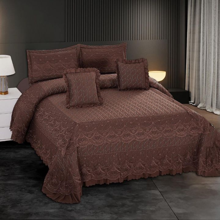 5 PC KING SIZE  QUILTED BEDCOVER WITH BEAUTIFUL LACE ON THE BORDER, PACKED WITH 2 FRILLED  PILLOW CASE &  CUSHIONS.
Size - 
 1. Bedcover-250x270 cms
2 Pillow case -46x69 cms 
2 Cushion Cover 40x40 cms 
