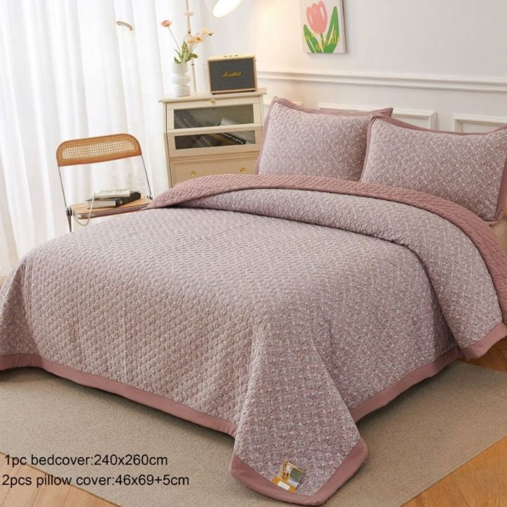 Bedding set with quilt and pillow covers in a bedroom setting