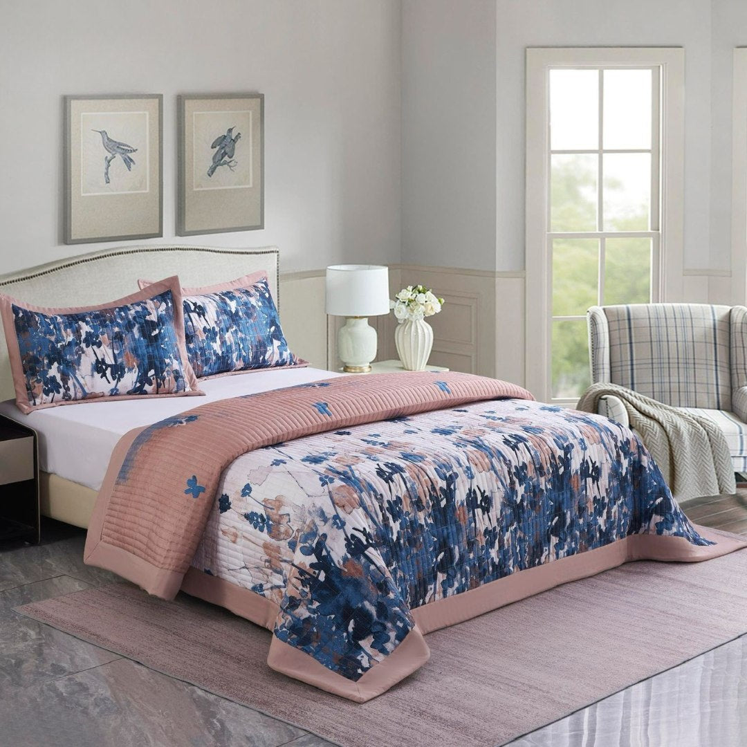 Bedroom with floral bedding and decorative pillows