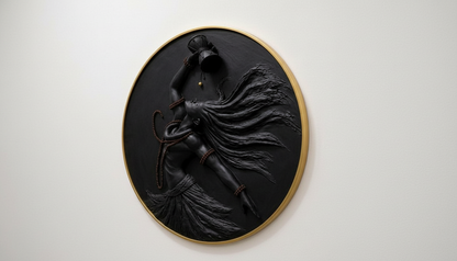 Black wall art of a woman with flowing hair on a white background