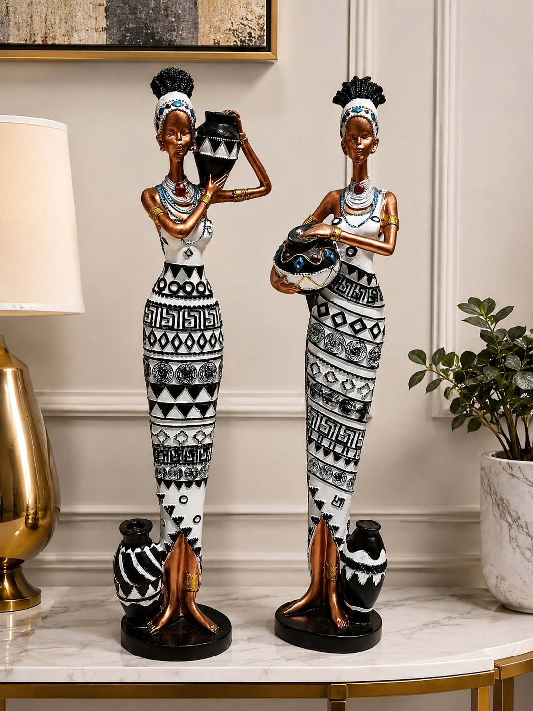 Abstract tribal grace duo sculptures by The Gharnish, modern figurines for home or office decor, featuring intricate tribal-inspired designs.