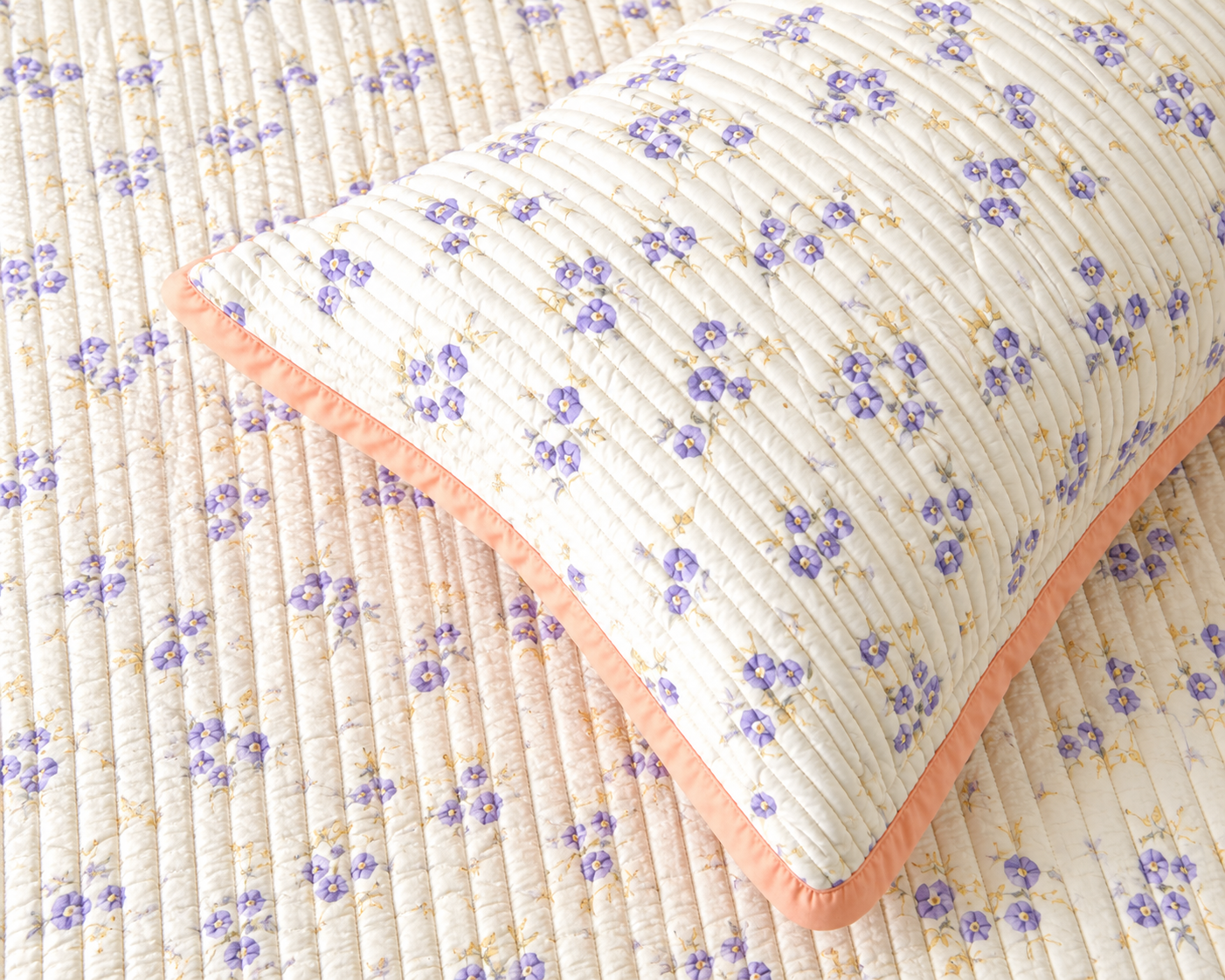 Soft floral bedding set of 3 with quilted bedcover and two matching pillow covers from The Gharnish.