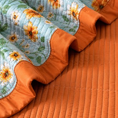 Soft floral bedding set of 3 from The Gharnish, quilted bedcover with two matching pillow covers, featuring colorful flower patterns.