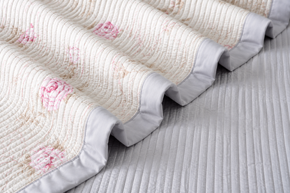 Floral bedding set of 3 with soft quilted bedcover and two matching pillow covers from The Gharnish.