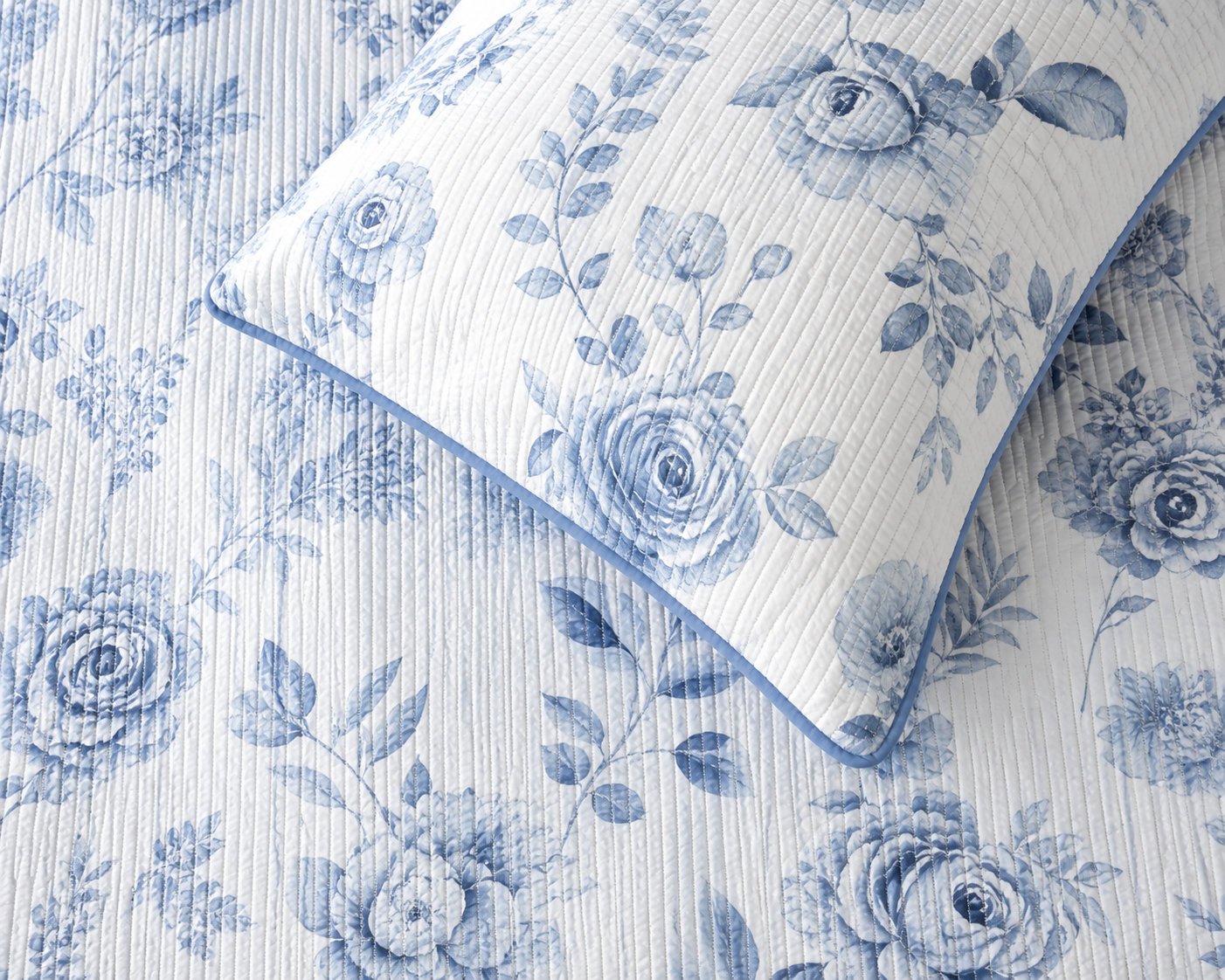 Soft floral bedding set of 3 pieces by The Gharnish, includes quilted bedcover and matching pillow covers in vibrant floral design.