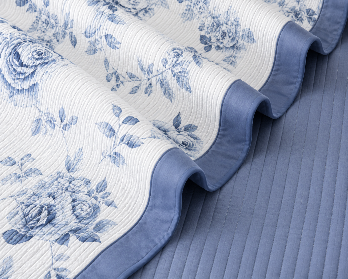 Floral bedding set of 3 pcs by The Gharnish, including a soft quilted bedcover and matching pillow covers on a bed.