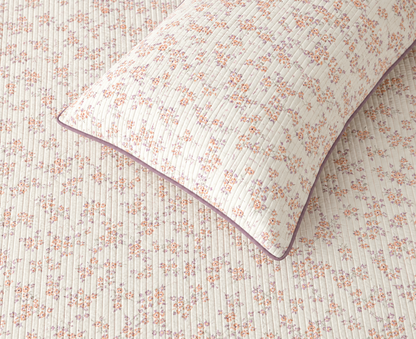 Soft floral bedding set of 3 pieces by The Gharnish, includes quilted bedcover and matching pillow covers.